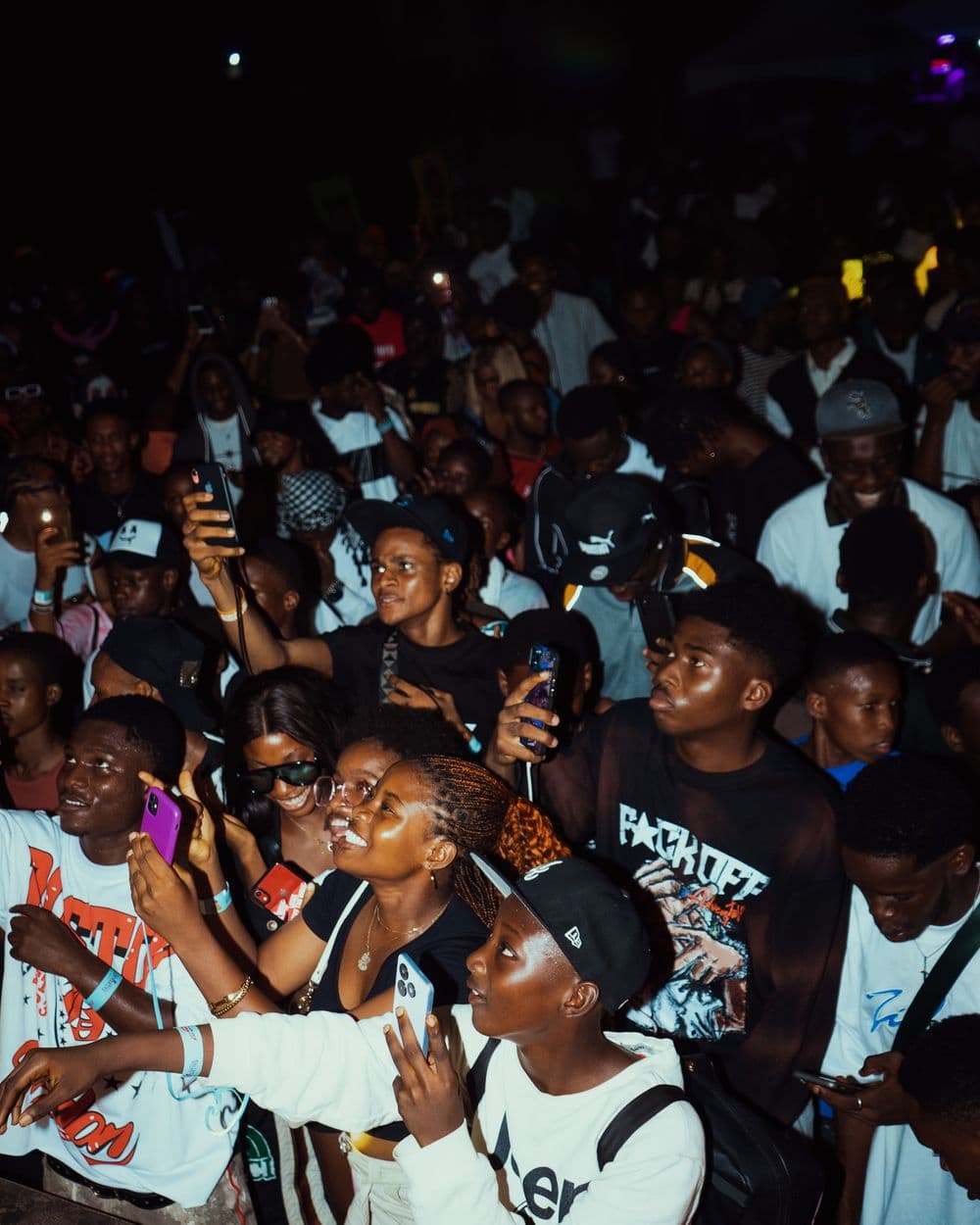 A hyped young crowd at a night show