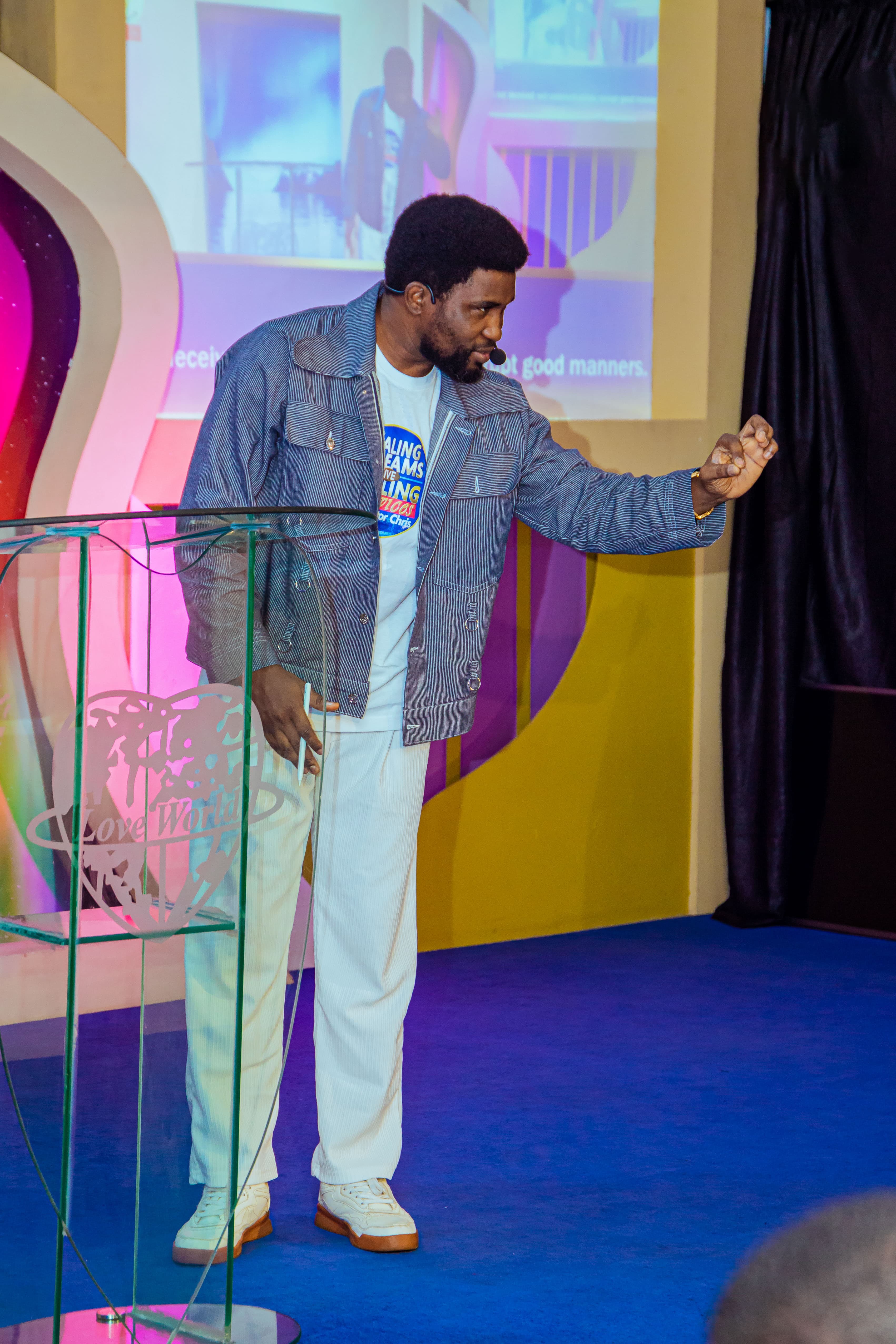 Our pastor preaching on stage